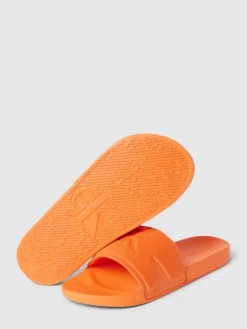 Calvin Klein Jeans Slides Mit Label-Detail Modell 'FREQUENCY' - Orange -Modegeschäft Für Damenschuhe 8l656k9m9134qhq96t3jejhna10j8lid6h936j1o8l0kgcqg7514skpp89b56ja26h4lah24a8p32dhh90o32d9m60q32oj160ojgdhkckr66eb16gsj4dhnc4qj2p34cdgjepg